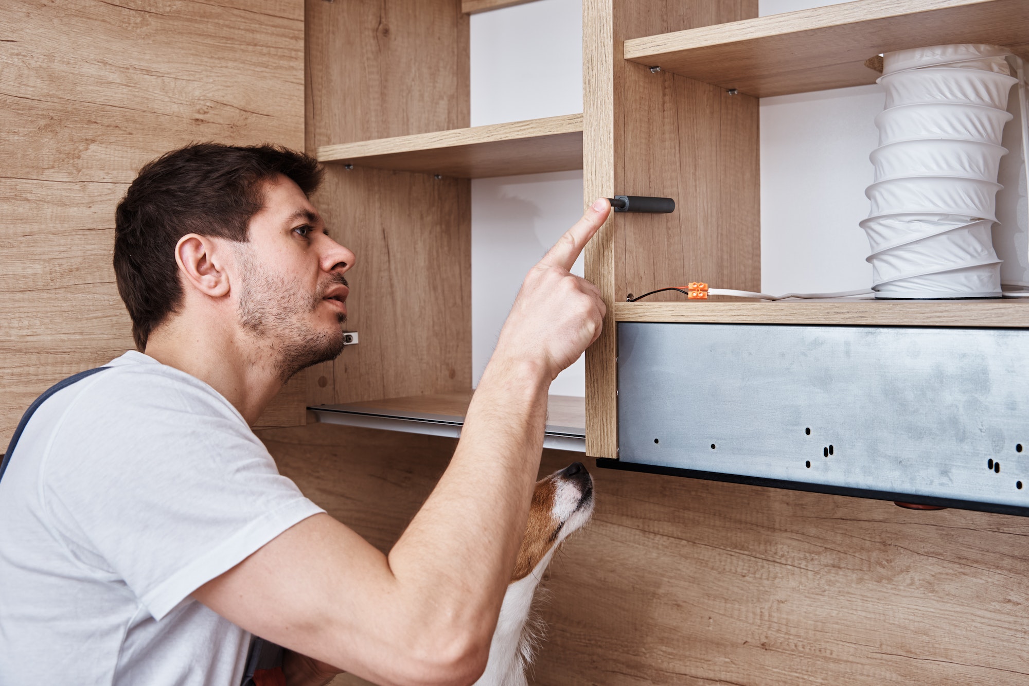 Man serving kitchen furniture